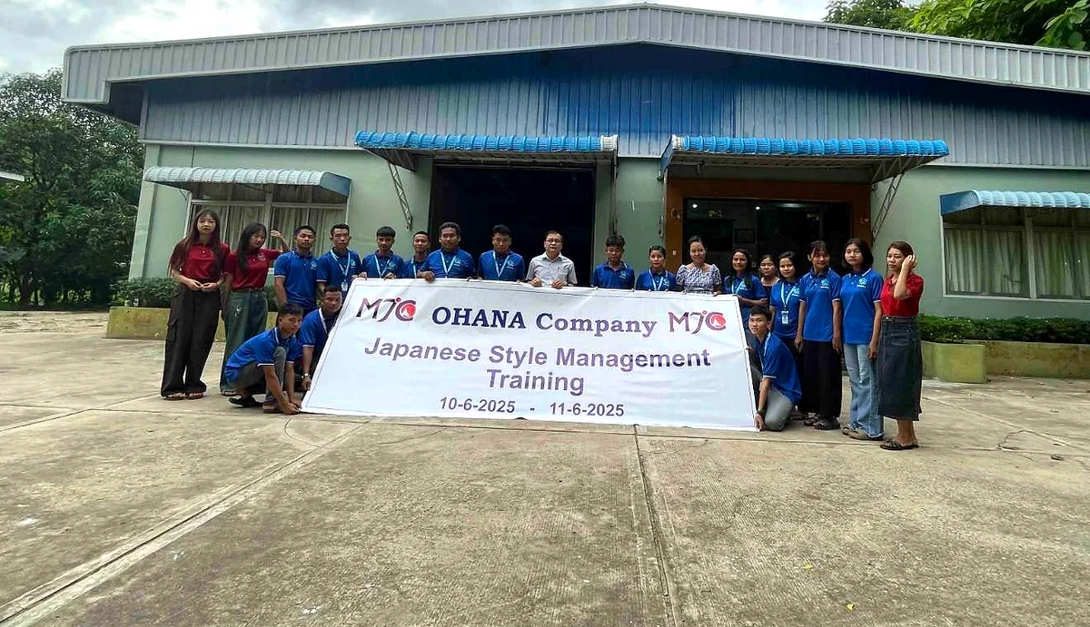Ohana team participants standing together with Myanmar Japan Center management training banner in June 2025
